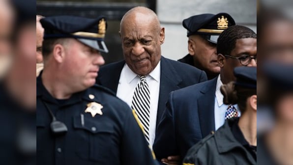 Comedian Bill Cosby attends first day of trial; remains silent in court
