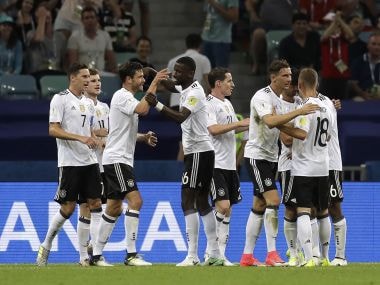 Germany players celebrate after scoring their third goal during the semi-final. AP