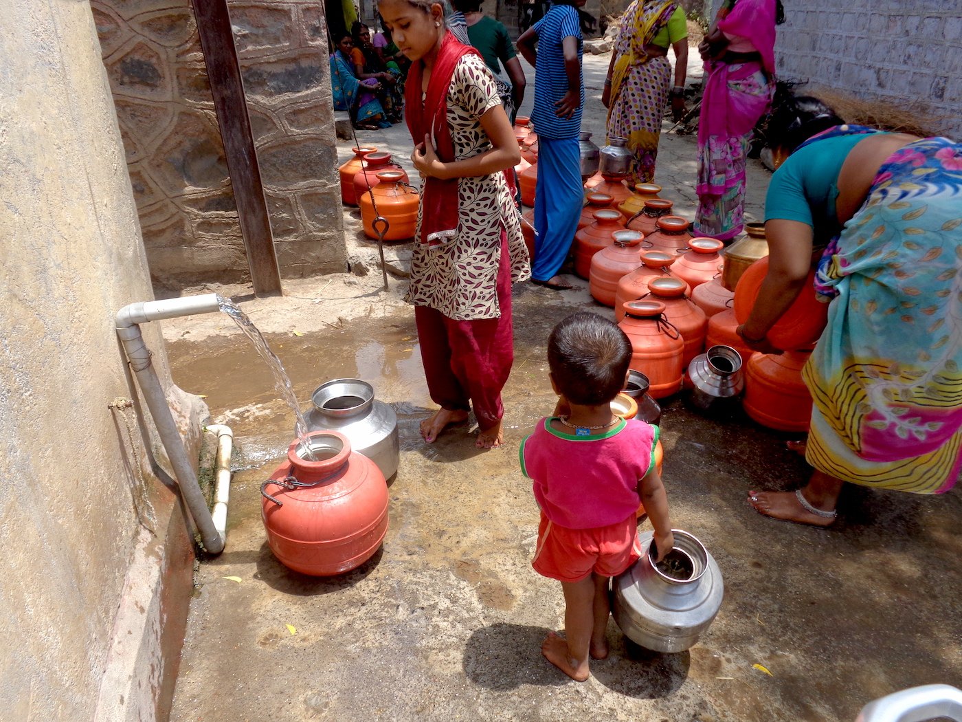 Desperate for water: children as young as five queue up with their pots in Takwiki village. Parth MN