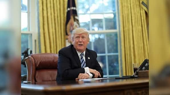 Donald Trump lashes out at critics, defends presidency despite 'distraction of witch hunt'