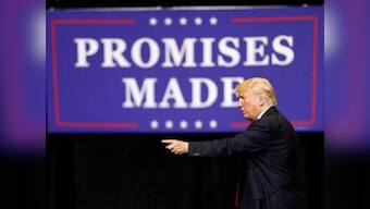 Donald Trump hits campaign trail in Iowa, attacks media, insists he is winning against all odds