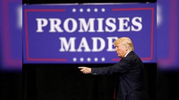 Donald Trump hits campaign trail in Iowa, attacks media, insists he is winning against all odds