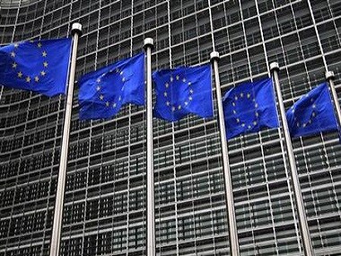 European Union flags fly in front of the European Commission headquarters in Brussels. Reuters