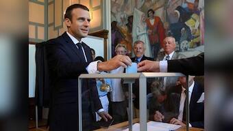 As France votes in parliamentary elections, Emmanuel Macron's party set to clinch landslide majority
