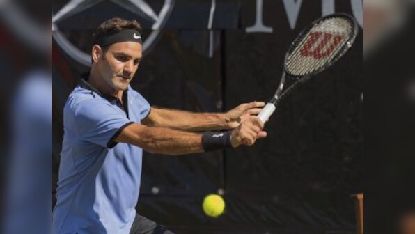 Halle Open: Roger Federer beats Yuichi Sugita in opening round to claim first win of grass-court season