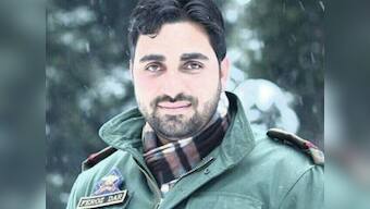 Feroz Ahmad Dar, dutiful father and conscientious police officer, slain by a flurry of LeT bullets