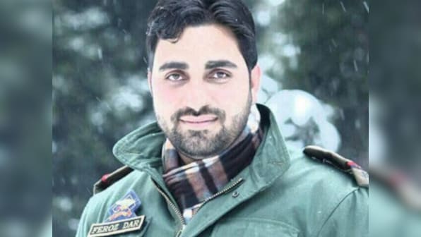 Feroz Ahmad Dar, dutiful father and conscientious police officer, slain by a flurry of LeT bullets