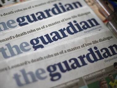 Britain's Guardian and Observer newspapers to switch to tabloid format, in bid to save costs