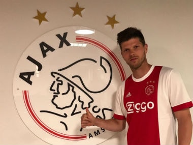 Klaas-Jan Huntelaar poses after signing a one year deal with Ajax. Twitter: KJ_Huntelaar