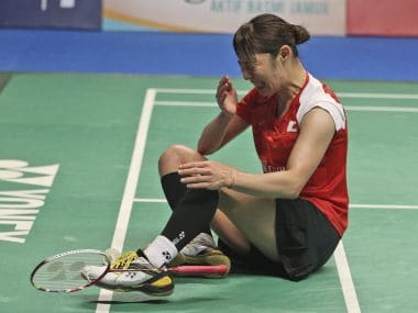 Sayaka Sato reacts after defeating Sung Ji-hyun during their women's singles final. AP