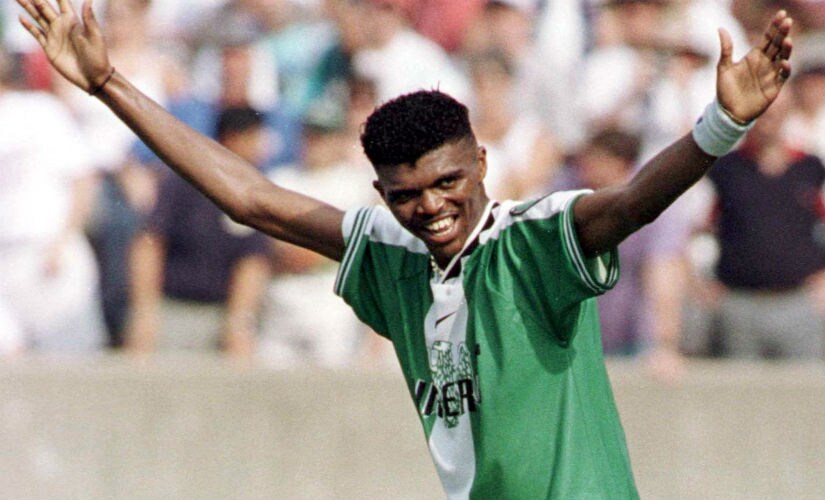 Nigeria's Captain Nwankwo Kanu (top) is carried around the field by teammate Kincsley Obiekwu to celebrate their victory against-Argentina in the men's gold medal soccer match, August 3. Nigeria defeated-Argentina 3-2. Reuters
