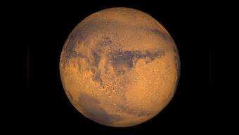 Mars Reconnaissance Orbiter captures stunning images of snowy dunes on the surface of Mars