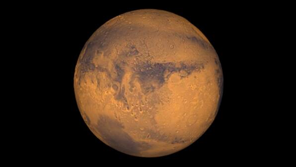 Mars Reconnaissance Orbiter captures stunning images of snowy dunes on the surface of Mars