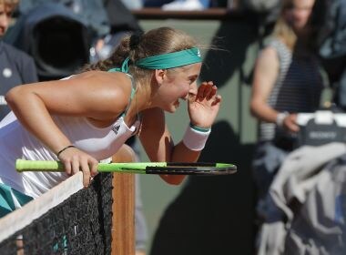 Jelena Ostapenko reacts during the match against Timea Bacsinszkyon Thursday. AP