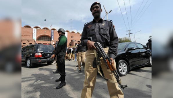 Pakistan gunfight kills three policemen, one attacker; local militants blamed for attack