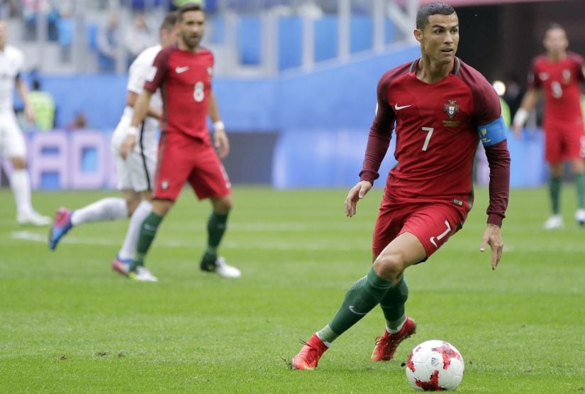 Portugal's Cristiano Ronaldo controls the ball during the Confederations Cup, Group A soccer match between New Zealand and Portugal, at the St. Petersburg Stadium, Russia, Saturday, June 24, 2017. (AP Photo/Pavel Golovkin)