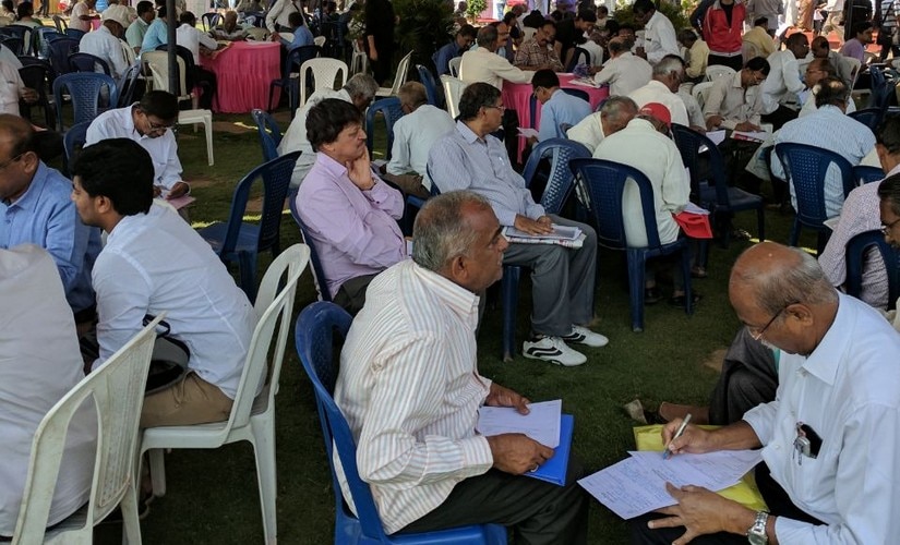Senior citizens register their names at a job fair organised for them by Nightingales Empowerment Foundation. NEF and Janalakshmi Financial Services