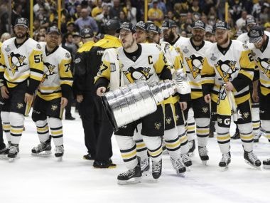 Pittsburgh Penguins' Sidney Crosby celebrates with the Stanley Cup after defeating the Nashville Predators. AP