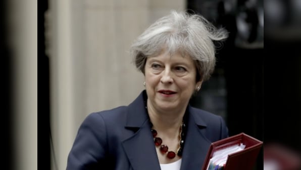 Theresa May, Shinzo Abe join hands to increase pressure on North Korea amid missile tests