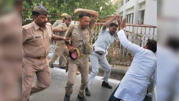 Police assault Samajwadi Party workers for showing black flags to Yogi Adityanath's convoy