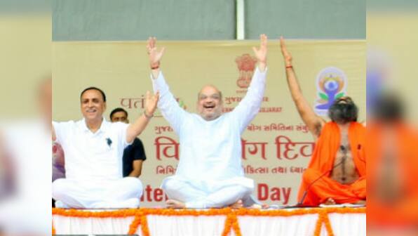 International Yoga Day: Narendra Modi does asanas with 51,000 in Lucknow despite rain, says yoga connects world