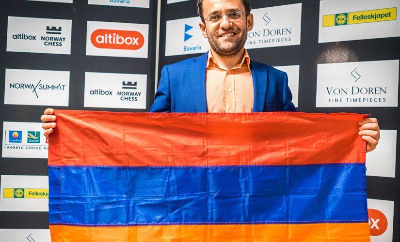 A proud Levon Aronian with the Armenian flag. Image courtesy Lennart Ootes.