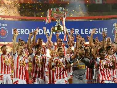 ATK celebrate with the ISL trophy after winning the final against Kerala Blasters FC last year. Sportzpics
