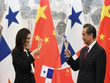 Panama's foreign minister Isabel de Saint Malo and her Chinese counterpart Wang Yi . AP