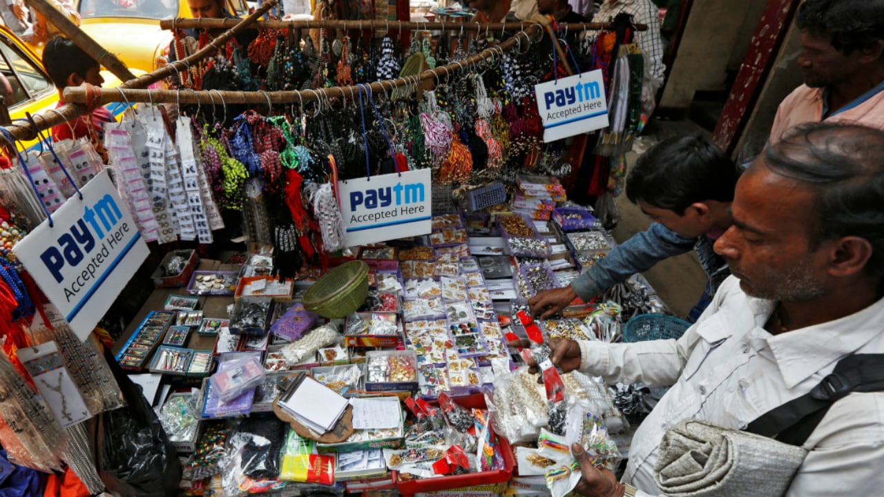 Advertisements of Paytm, a digital wallet company, are seen placed at a road side stall in Kolkata (representational photo). Reuters