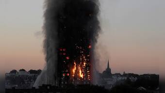 London fire at Grenfell Tower: Cladding used for building renovation is banned in UK, ministers reveal
