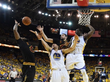 Golden State Warriors and Cleveland Cavaliers players in action during the 4th quarter in game five of the 2017 NBA Finals. Reuters