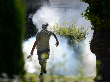 Kashmir unrest: LeT militant Junaid Ahmad Matoo killed; protesters clash with armed forces near encounter site Kashmir unrest: LeT militant Junaid Ahmad Matoo killed; protesters clash with armed forces near encounter site