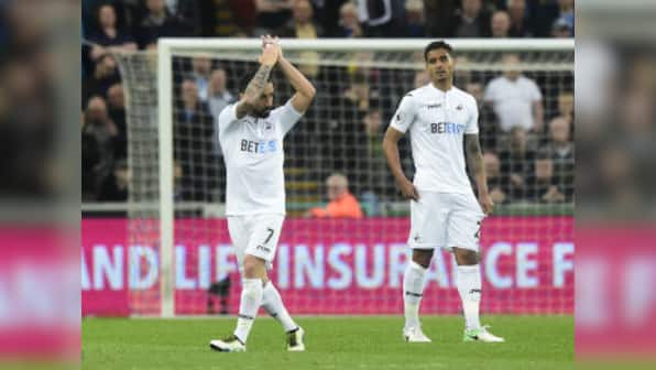 Premier League: Swansea City captain Leon Britton signs improved one-year deal with club