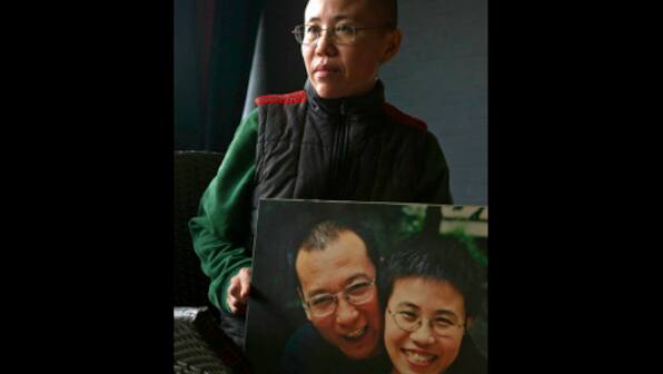 China faces international pressure to free Nobel laureate Liu Xiaobo's widow