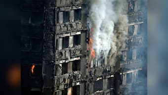 Theresa May says inflammable coating found in many residential tower blocks in UK