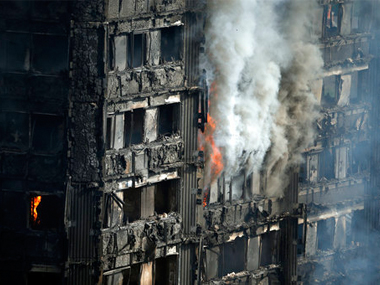 Theresa May says inflammable coating found in many residential tower blocks in UK Theresa May says inflammable coating found in many residential tower blocks in UK