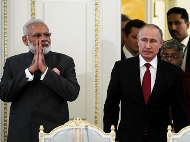 Indian prime minister Narendra Modi (left) and Russian president Vladimir Putin (right) arrives to attend a meeting with businessmen at the St. Petersburg International Economic Forum in St. Petersburg. AP