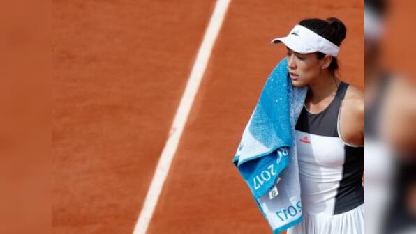 French Open 2017: Tearful Garbine Muguruza slams 'disrespectful' crowd after Roland Garros exit