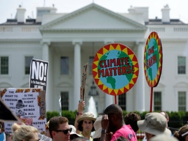People protesting against Donald Trump's stand on Paris climate deal. Reuters