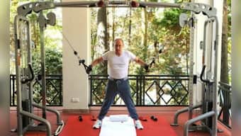 Behind the iron curtain: Vladimir Putin's fitness secrets include swimming and playing with his dog