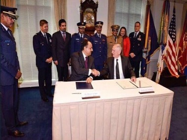 The deal being signed. Twitter/ @Amb_AlThani