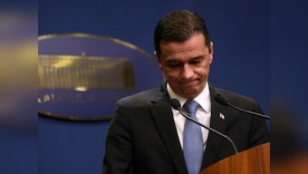 Romania's premier refuses to quit despite no-confidence motion from ruling party accusing him of 'immaturity'
