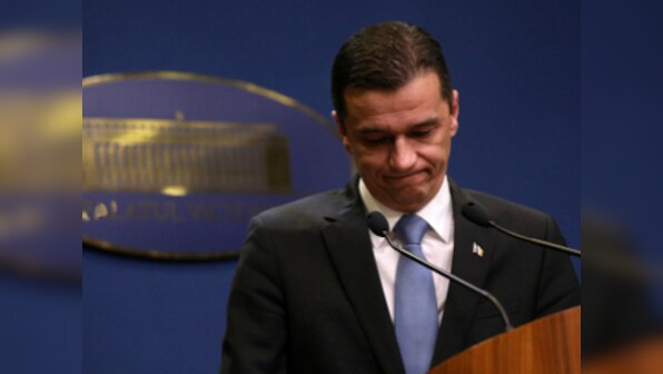 Romania's premier refuses to quit despite no-confidence motion from ruling party accusing him of 'immaturity'