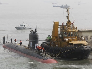 File photo of Indian Navy's Scorpene submarine INS Kalvari being escorted by tugboats as it arrives at Mazagon Docks in Mumbai. Reuters