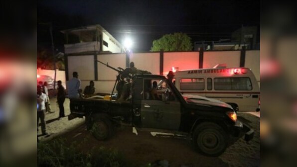 Somalia bombing: At least 18 dead in Mogadishu, 20 others held hostage by Al-Shabaab militants