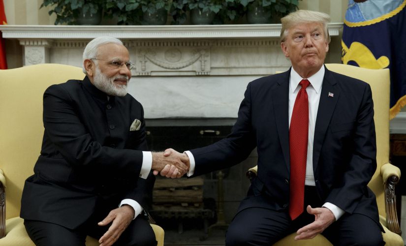 President Donald Trump shakes hands with Prime Minister Narendra Modi during their meeting in the Oval Office of the White House in Washington on Monday. AP