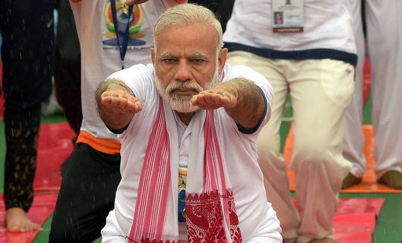 International Yoga Day: Narendra Modi does asanas with 51,000 in Lucknow despite rain, says yoga connects world