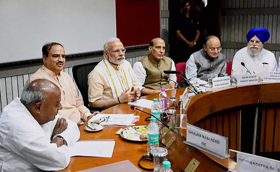 The prime minister, flanked by Home Minister Rajnath Singh, Finance Minister Arun Jaitley, Ananth Kumar, SS Ahluwalia and JDS president HD Deve Gowda, also urged all parties to extend their support to the government in fighting corruption. Hinting at Trinamool Congress and RJD on the issue of corruption, Modi said the political class should join hands against those who seek an escape route by dubbing action against them in graft cases as a political conspiracy. PTI The prime minister, flanked by Home Minister Rajnath Singh, Finance Minister Arun Jaitley, Ananth Kumar, SS Ahluwalia and JDS president HD Deve Gowda, also urged all parties to extend their support to the government in fighting corruption. Hinting at Trinamool Congress and RJD on the issue of corruption, Modi said the political class should join hands against those who seek an escape route by dubbing action against them in graft cases as a political conspiracy. PTI