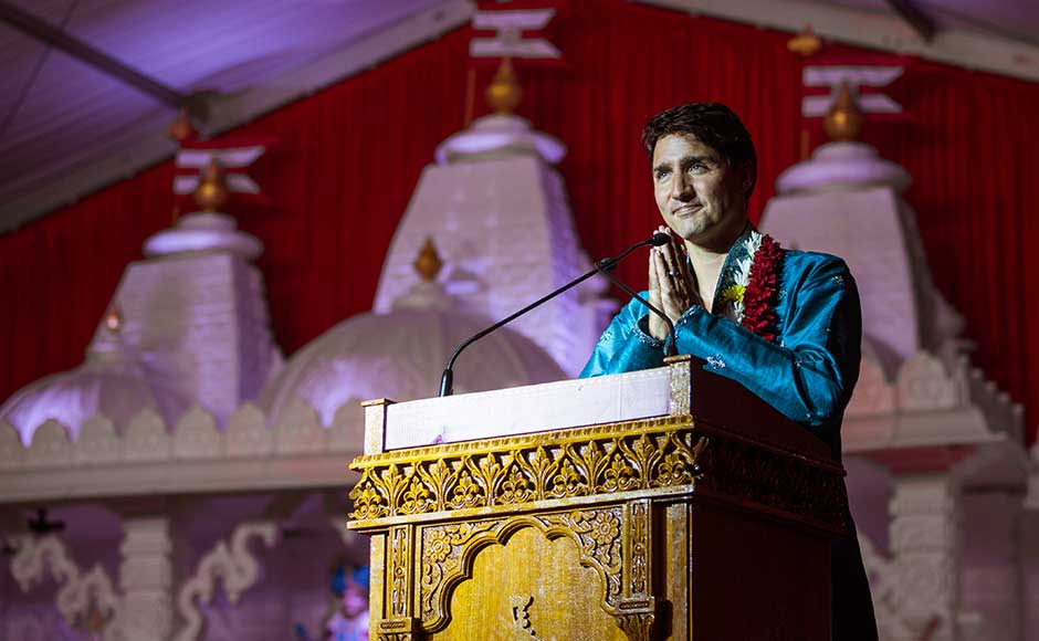 Donning a traditional blue kurta and pajama along with a flower garland draped on his neck, Trudeau participated in the rituals and celebrations in the temple. AP Donning a traditional blue kurta and pajama along with a flower garland draped on his neck, Trudeau participated in the rituals and celebrations in the temple. AP