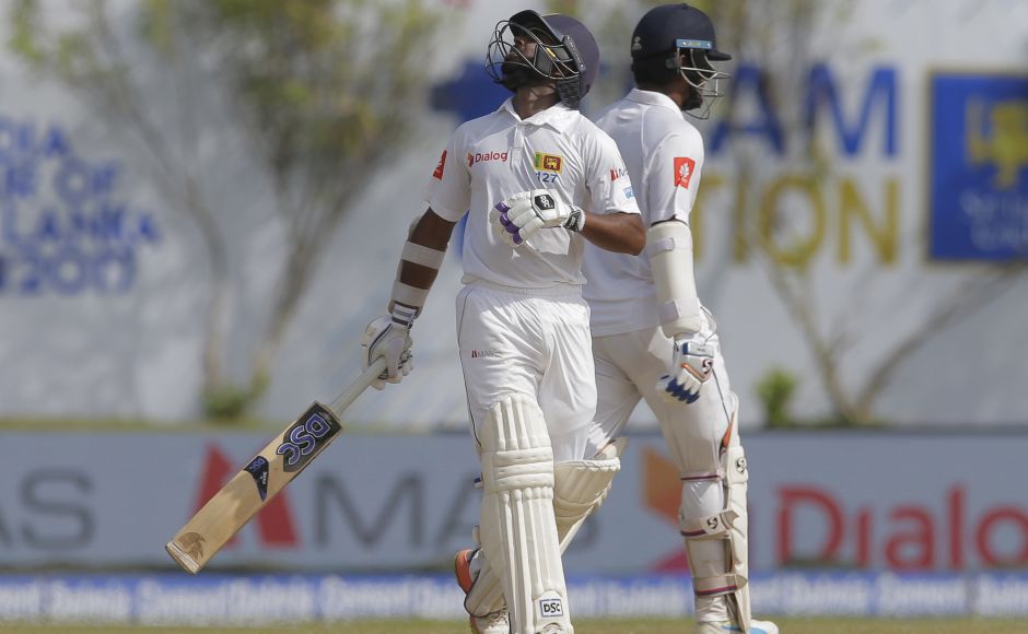 Opener Dimuth Karunaratne and wicketkeeper Niroshan Dickwella steadied Sri Lanka after they lost two quick wickets. AP Opener Dimuth Karunaratne and wicketkeeper Niroshan Dickwella steadied Sri Lanka after they lost two quick wickets. AP